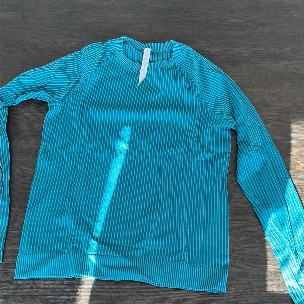 Lululemon rest less pullover crew neck activewear in ribbed green jasper!